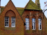 07-detail-of-window-hoods-on-front-of-the-red-house-by-jacqueline-banerjee
